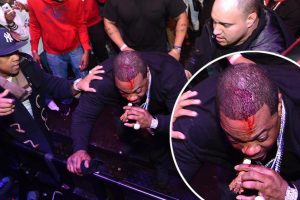 Busta-Rhymes-take-a-spill-while-leaning-into-the-pit-during-surprise-